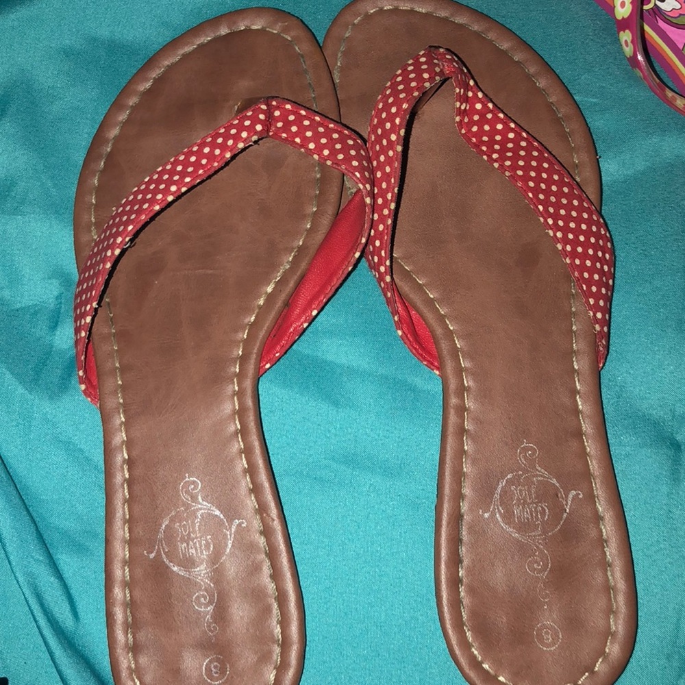 Flip flops, worn twice.